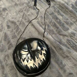 Spirit Black Round Crossbody Bag with Silver Accent Face